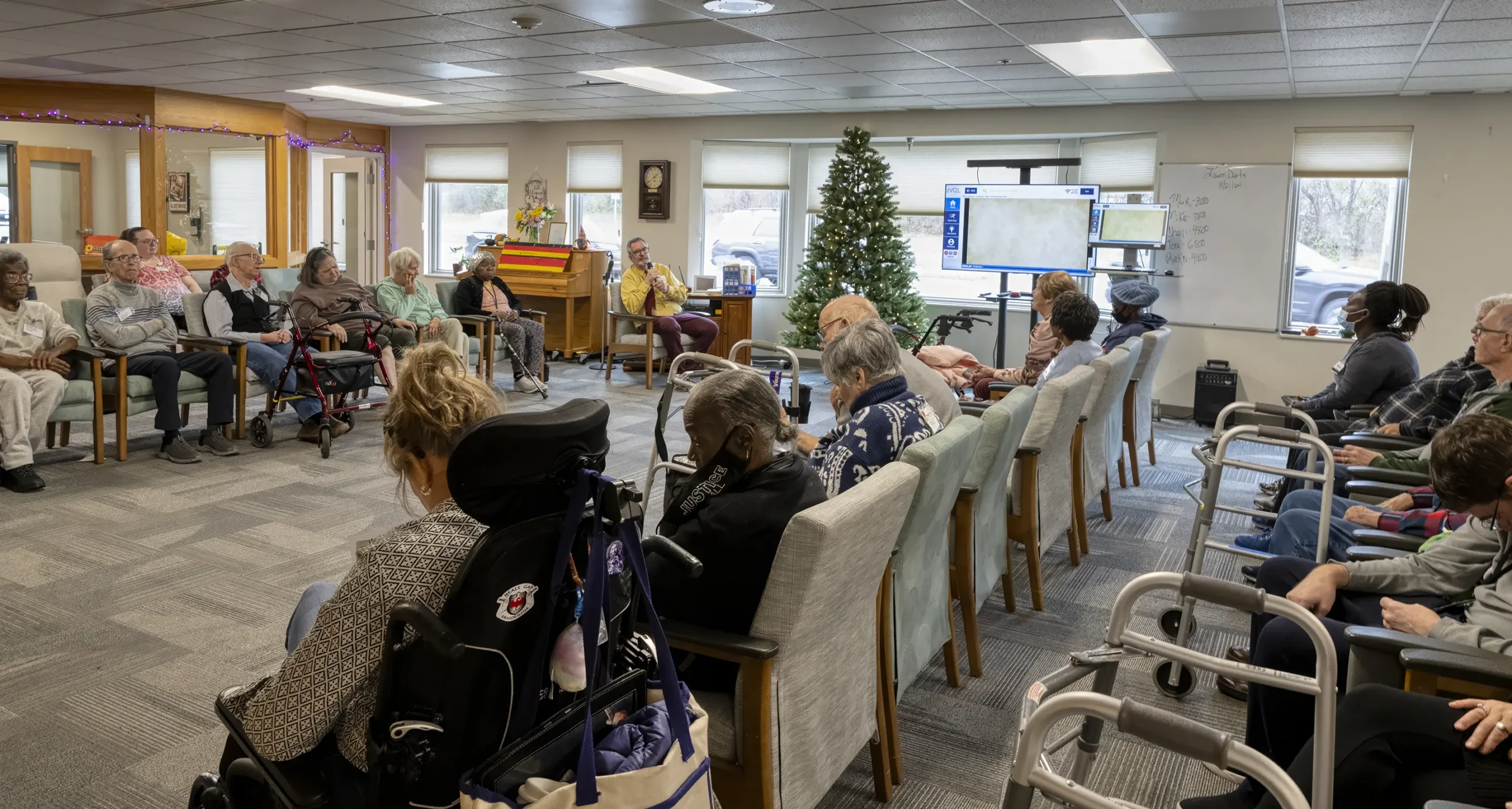 Elderly adults enjoying senior recreation at Adult day care near me in South Minneapolis, Minnesota.