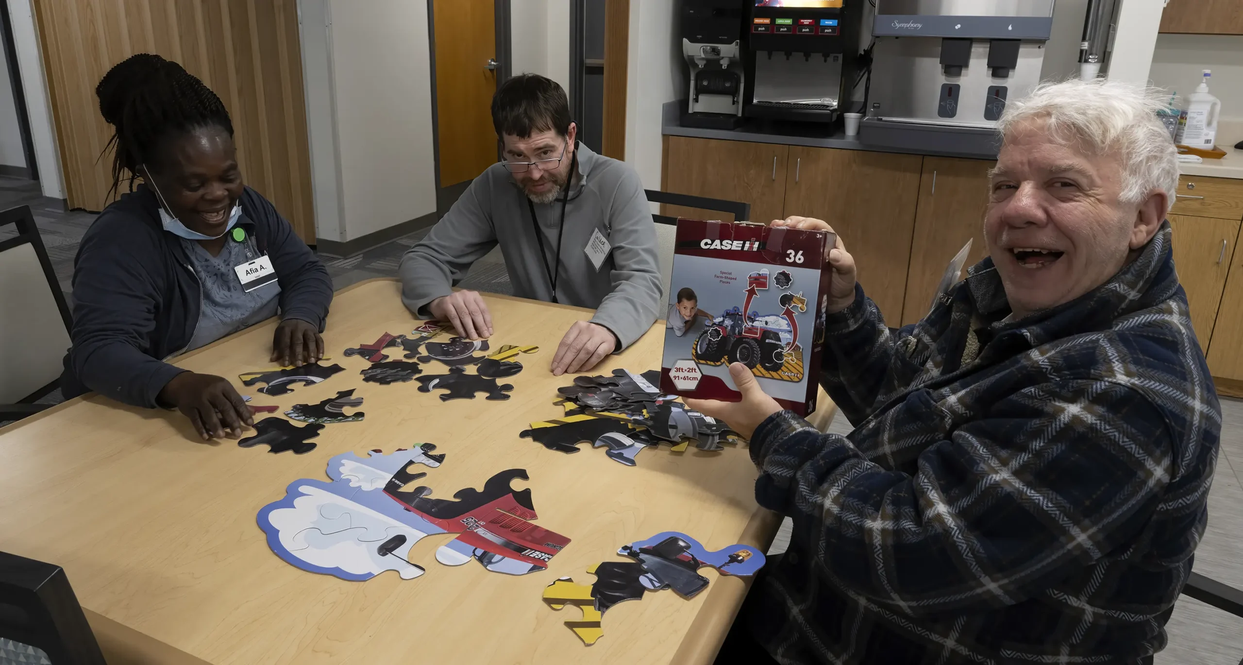 Caregiver and senior adult at Adult day care center near Edina, MN.
