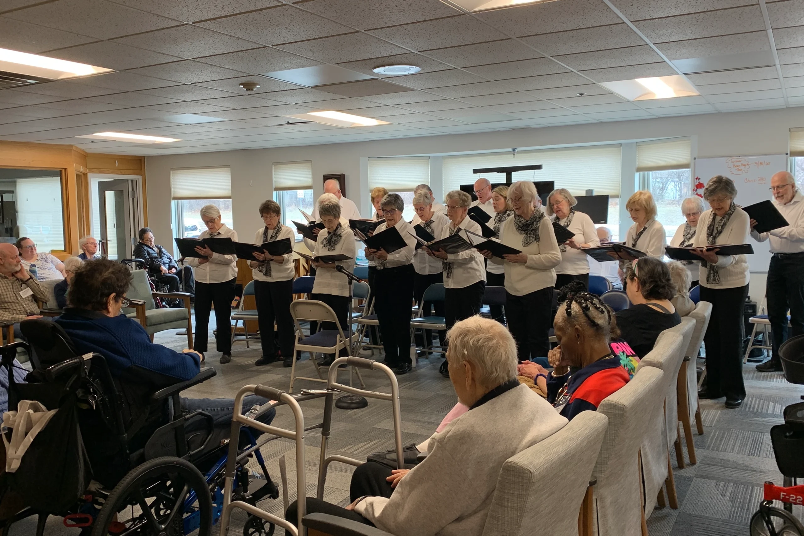 Staff and a participant in elderly activity program near Bloomington, Minnesota.
