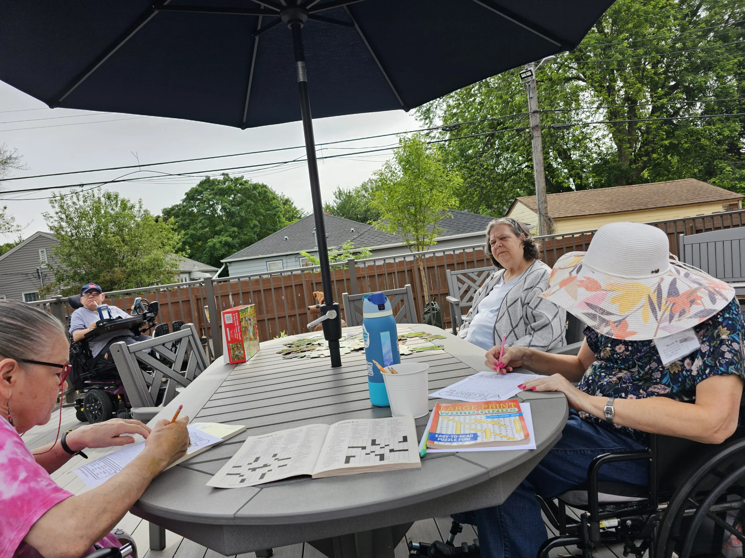 Senior recreation near me on a deck at an adult day care center.